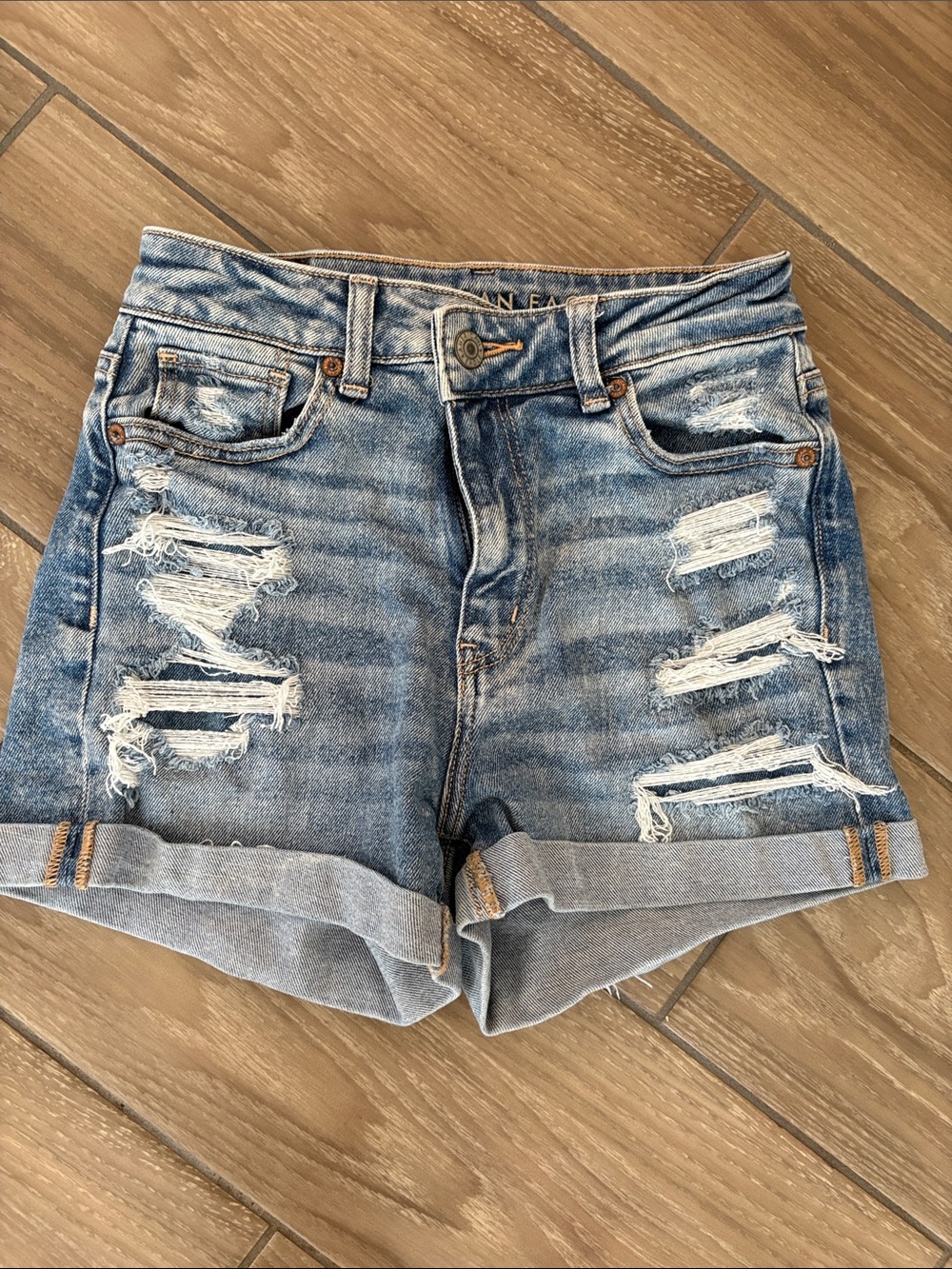American Eagle Distressed blue denim jean cuffed shorts Women’s Size 0